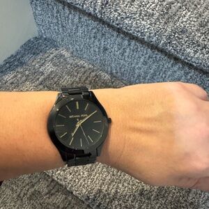 Michael Kors slim face black and gold watch